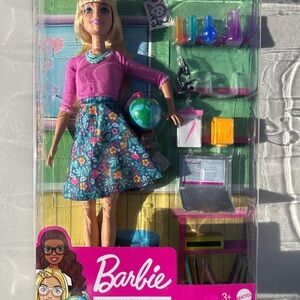 Barbie Doll with Pink Top and Floral Blue Skirt